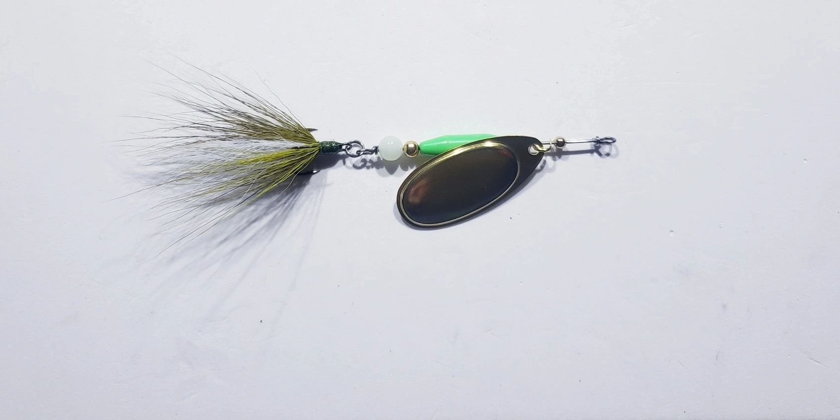 Bright green with Olive & white buck tail & Glow bead